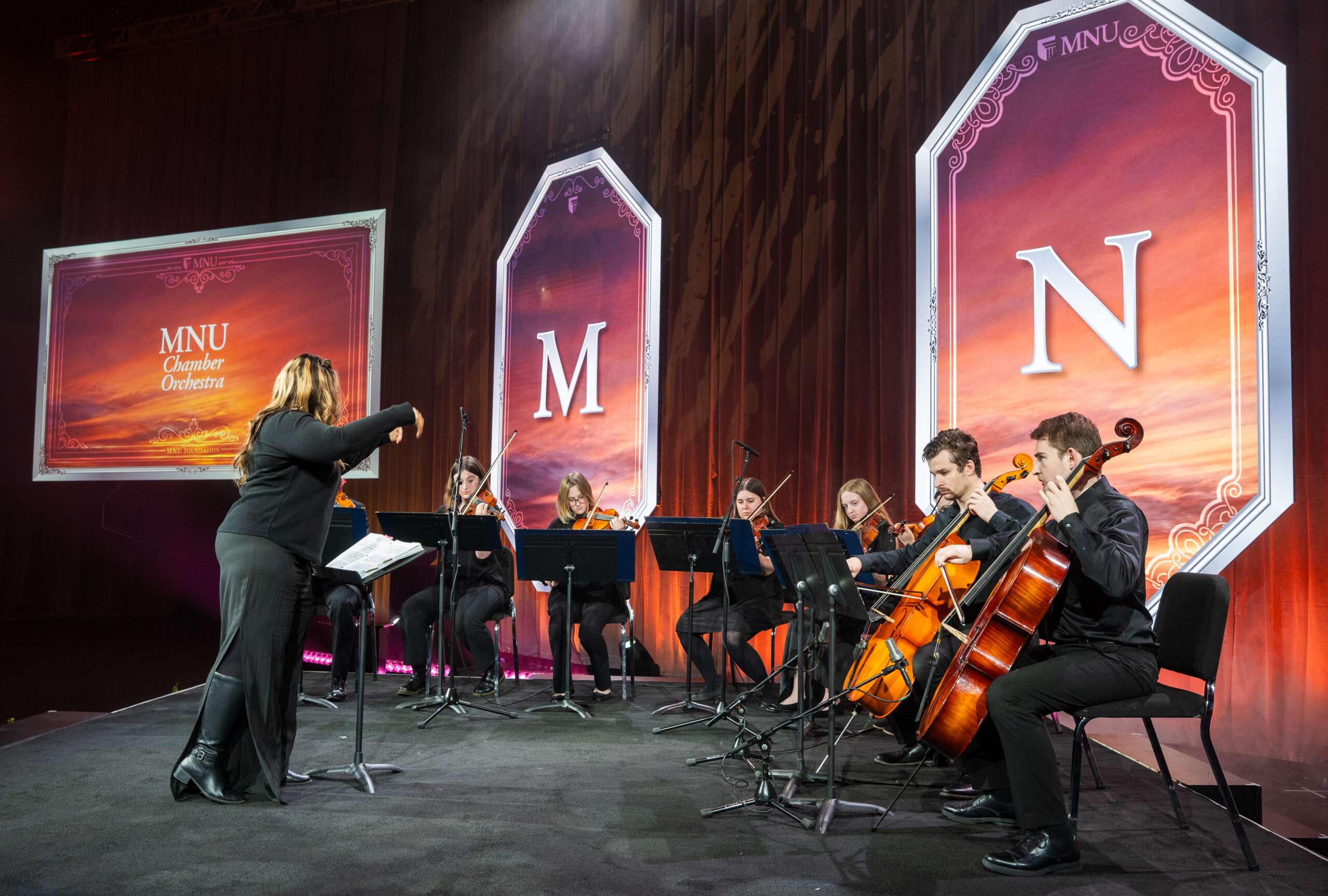 Orchestra playing on stage at 2024 President's Honors