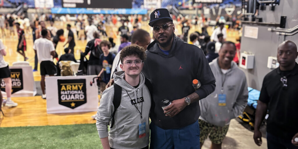 Zach Janner with Carmelo Anthony at elite basketball tournament